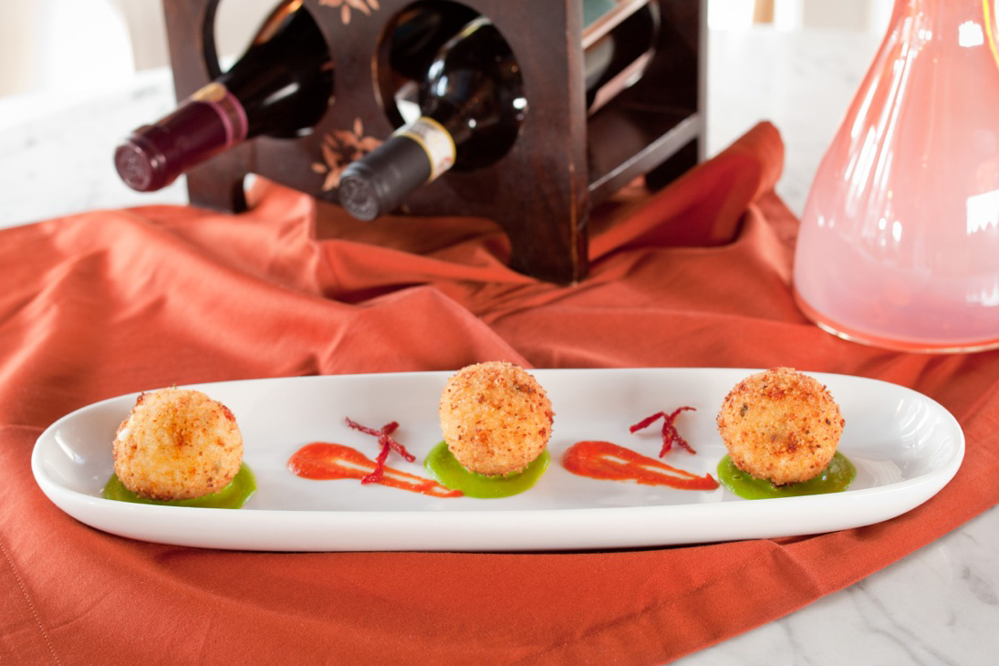 © rob warner photography 2014 This was suppli dish patterned after the dish I had in Monza that was on our last menu. Convito Chef Noe Sanchez added sun-dried tomatoes to the suppli filling and placed them atop a pea puree